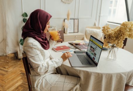 Woman in Hijab using a Laptop for online dating