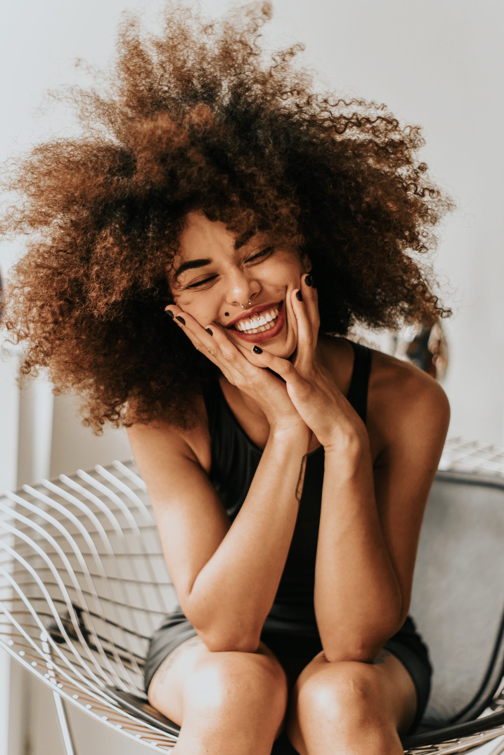 woman smiling happily