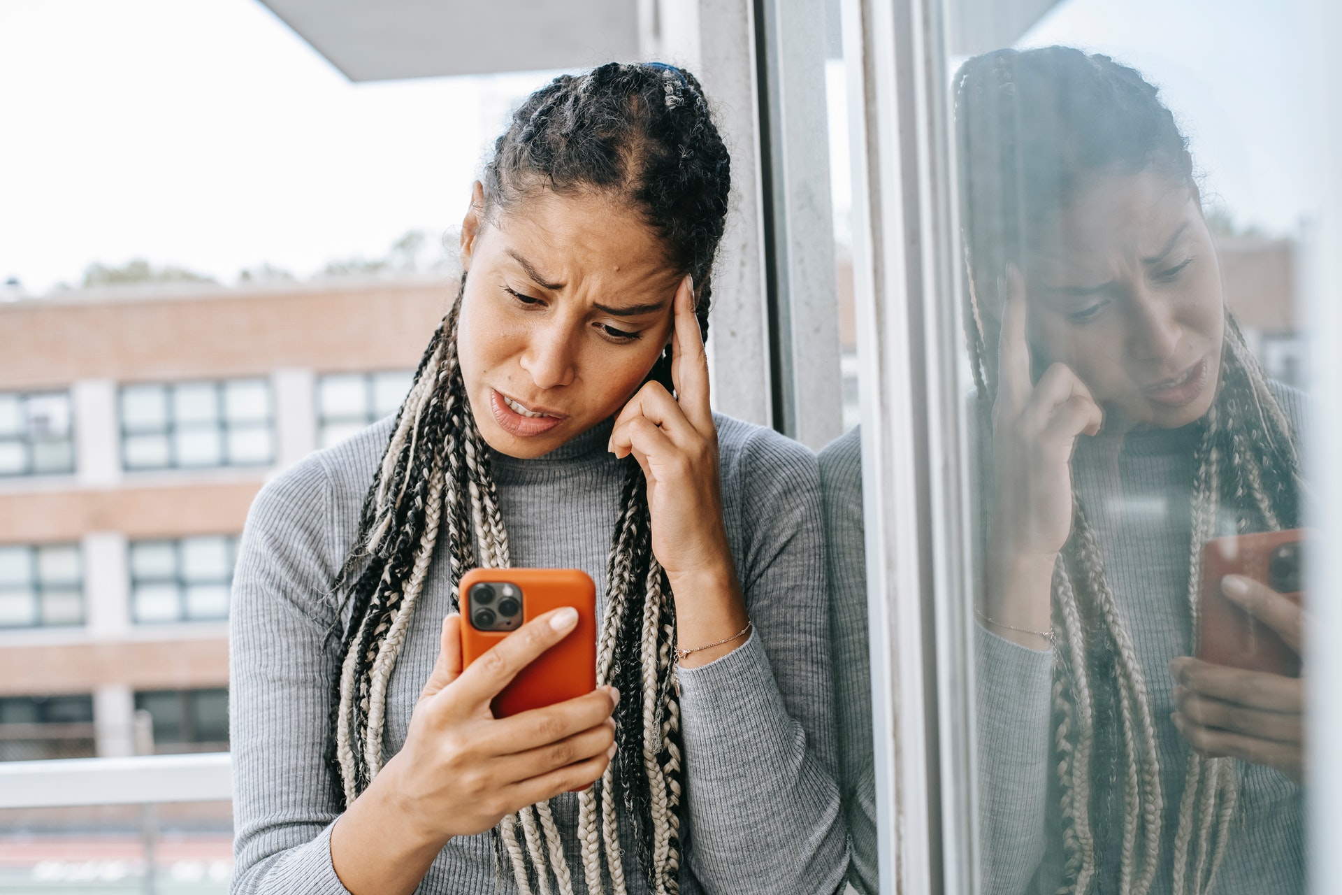 a woman browsing mobile phone