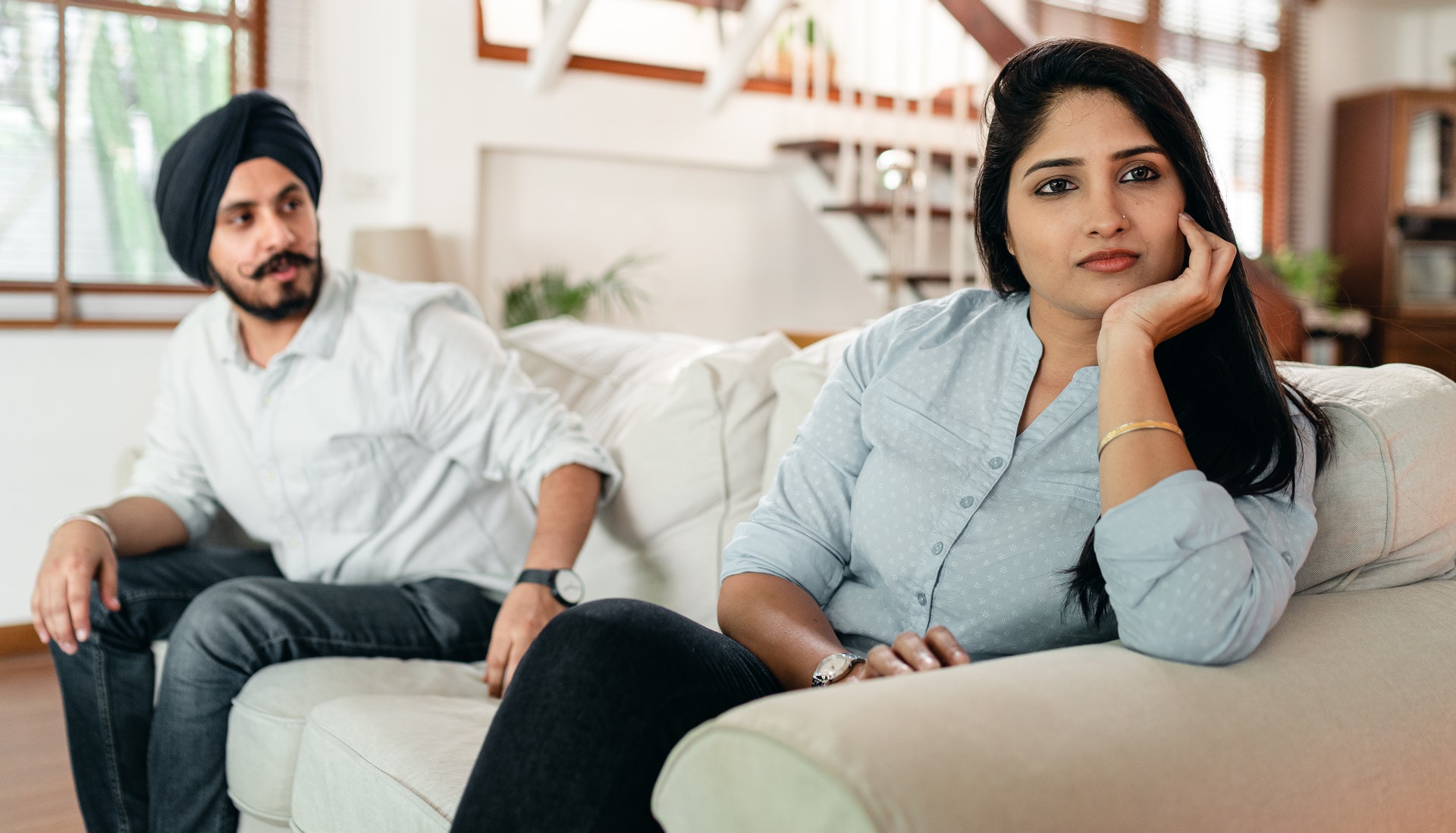 a couple sitting in living room