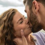 a man kissing a woman as it's how men show love