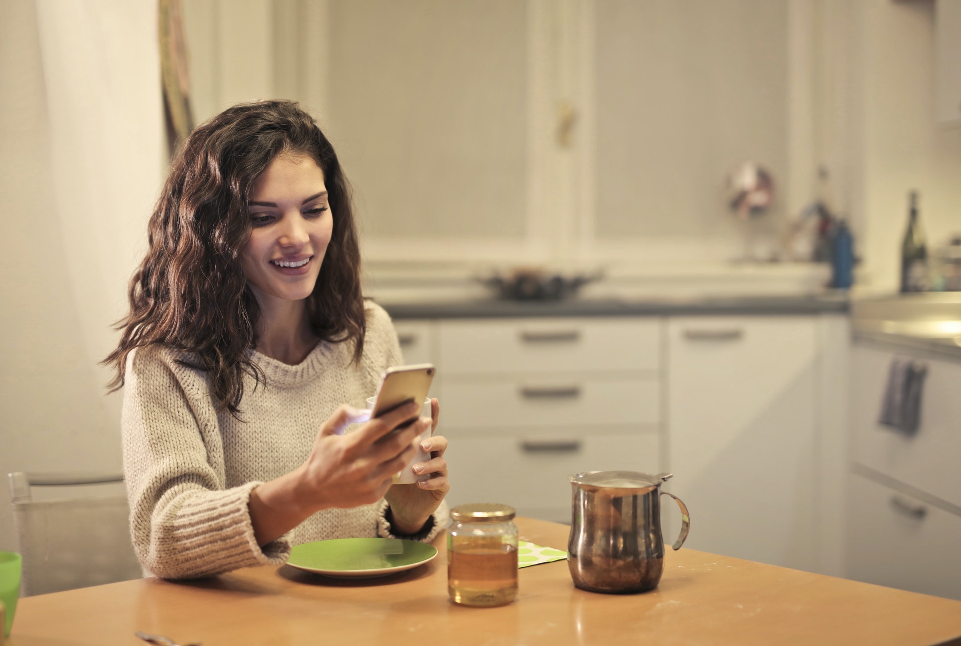 a woman is texting to keep a conversation going