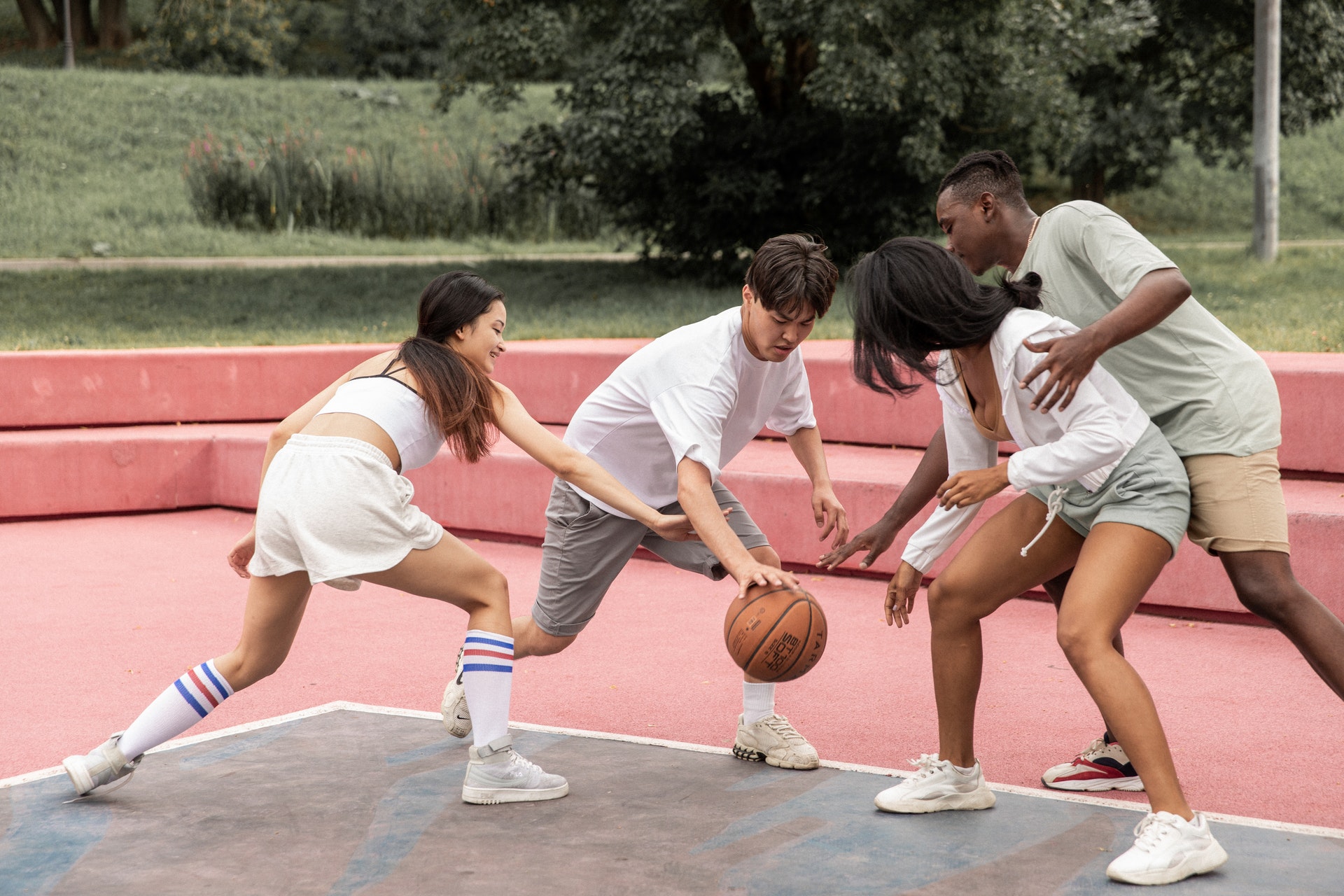 a diverse young people play sport